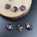 Faceted heart-shaped purple crystal pendant with gold-plated trim and metal bail - Amethyst