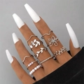 Silver multi-piece stackable ring set with pearls and hollow heart designs on model hand - Silver (22663-silver)