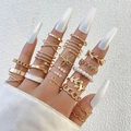 Bohemian gold butterfly and pearl multi-piece knuckle ring set shown on model - Gold Pearl Hollow Style (25304-gold)