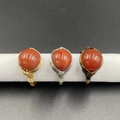 Handcrafted wire-wrapped ring set with red carnelian beads in gold, silver, and bronze finish - Red Agate