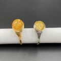 Handcrafted wire-wrapped ring featuring a round citrine gemstone bead in gold and silver finish - Colored Citrine