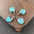 Set de cuatro piedras ovaladas azul cielo con vetas negras y enganches plateados - Turquesa Sintética