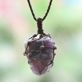 Handmade mesh net pendant with purple raw crystal and dark brown woven cord - Deep Amethyst
