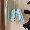 Light blue nylon drawstring tote bag with cartoon print and dark blue woven handles - Light Blue (Two Friends)