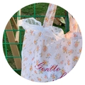 Detailed macro view of the lace bow and floral pattern on this Japanese style tote bag - White Lace Ribbon