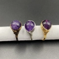 Handcrafted silver, gold, and bronze wire-wrapped rings with purple amethyst beads - Amethyst