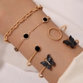 Set di cinque bracciali dorati con farfalla nera e braccialetti geometrici aperti - Set da Cinque Pezzi Nero (23020-black)