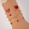 Ensemble de cinq bracelets dorés avec papillons rouges et pierres précieuses - Ensemble Cinq Pièces Rouge (23020-red)