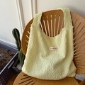 Pale yellow textured bubble fabric shoulder bag with pink have a nice day woven label - Yellow Pleated Style