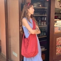 Grote rode denim crossbodytas voor dames met stijlvol trekkoord aan de zijkant - Crossbody Tas (Groot) / Retro Koper