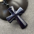 Blue goldstone cross pendant necklace with black braided cord and sparkling star effect - Blue Goldstone (Synthetic)
