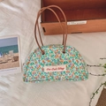 Bolso de mano semicircular de lona con estampado floral y asas de cuero marrón - Bolso de Parche Floral Verde