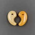 Natural agate stone Magatama pendants in translucent yellow and deep amber orange finishes - Topaz