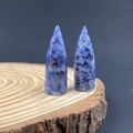 Polished blue sodalite bullet-shaped crystal points on a wooden tray set of 2 - Sodalite