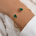 Elegant gold-plated open cuff bracelet featuring pear-cut green zircon stones for women - Teardrop-Shaped Green Gem Style (24786-gold)