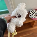 Détail du petit porte-monnaie en peluche blanche avec broderie de patte d'animal brune - Blanc