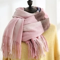 Pink and brown checkered cashmere-feel scarf with long fringe on a mannequin - Beibei Plaid Pink