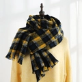 Classic yellow and navy blue plaid scarf with fringes on a warm yellow knit sweater - Circle Plaid Yellow