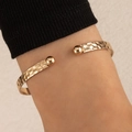 Golden hammer textured open cuff bracelet with spherical ends on female wrist - Hammered Process Double Round Ball Style (22010-gold)