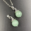 Pale green spherical jade necklace pendant with a silver witch hat design clasp - Green Aventurine 1pc