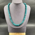 Malachite green natural stone necklace with hand-knotted abacus beads on a bust - Blue Map Stone