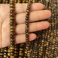 Tiras de cuentas de piedra ojo de tigre pulidas con brillo dorado para creación de joyería - Ojo de tigre
