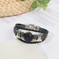 Vintage leather braided bracelet with dark blue star stone and silver bell charms - Blue Goldstone (Synthetic)