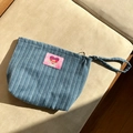 Blue corduroy toiletry bag with pink heart patch and zipper closure on fabric background - Dark Blue Vertical Stripe Denim Makeup Bag