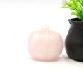 Hand-carved pink rose quartz pumpkin ornament with natural stone texture for decor - Rose Quartz