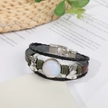 Vintage braided leather bracelet with green accents and opal stone charms - Opal (Synthetic)