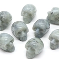 Miniature natural labradorite crystal skulls hand-carved with grey gemstone texture - Labradorite