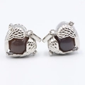 Silver owl pendant necklaces featuring detailed wings and brown round bead inserts - Grey Agate