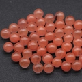 Polierte 12mm orange-rosa Naturkristallperlen mit lichtdurchlässiger Mineraltextur - Wassermelonenrot (Synthetisch)