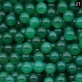 Polished 10mm green aventurine agate stone balls without holes in a bulk stack - Green Agate