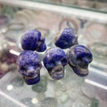 Five small natural Lapis Lazuli crystal skulls with deep blue and gold pyrite accents - Lapis Lazuli