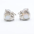 Silver owl pendant featuring a round white opal stone and detailed feather texture - Opal (Synthetic)