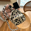 Mini leopard print earphone crossbody bag with thick woven strap and heart zipper - Beige Leopard