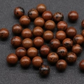 Polished 10mm round beads in natural red spotted jasper with smooth glossy finish - Mahogany Obsidian