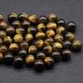 Polished 12mm tiger eye stone round beads with natural gold and brown textures - Tiger's Eye