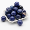Natural blue sodalite 20mm round stone spheres set with white marbling on white tray - Blue Sodalite