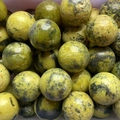 Spherical 20mm polished natural green stone beads with unique black spotted patterns - Red Howlite