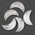 Five pieces of moon-shaped clear quartz crystals with natural ice textures on black background - White Crystal