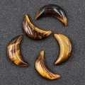 Polished 30mm tiger eye crescent moon crystals with brown chatoyant striped texture - Tiger's Eye