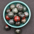 Polished natural 20mm bloodstone jasper spheres with green and red marble patterns - African Blood Stone