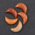 Polished crescent moon-shaped natural stones in orange and pink crystal set - Red Aventurine