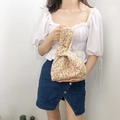 Japanese style floral knot wrist bag in cotton fabric with yellow and red flower patterns - Orange Red Floral Knot Bag