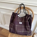 Brown plaid tote bag with drawstring closure and braided ropes on vintage wooden chair - L / Dark Brown Plaid (IT)