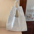 Quilted floral tote bag with blue rose pattern and spacious interior design - Light Blue Jacquard Rose (Tied Strap)