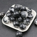 Natural black marble decorative stone ball with white veins for home decor, 20mm sphere - Zebra Stone