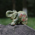 Elephant statue carved from natural unakite stone with green and red patterns - Unakite